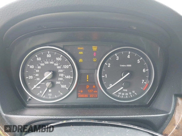 2008 BMW 3 Series 328i with VIN WBAVA37518NL53526, listed as a IAAI auction lot 41956298 with 208,586 mi miles and . Bid and sale history available at DreamBid. Image 7.