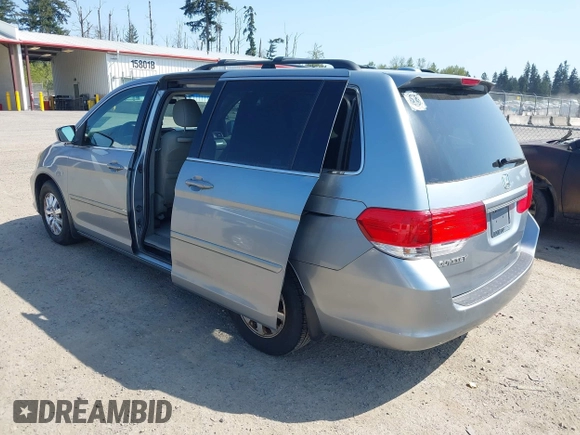 2009 Honda Odyssey EX-L with VIN 5FNRL38779B013943, listed as a IAAI auction lot 42119422 with 147,285 mi miles. Bid and sale history available at carsss.com. Image 3.