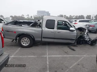 2003 Toyota Tundra SR5 with VIN 5TBBT44113S350273, listed as a IAAI auction lot 40482066 with 219,831 mi miles and . Bid and sale history available at DreamBid. Image 14.