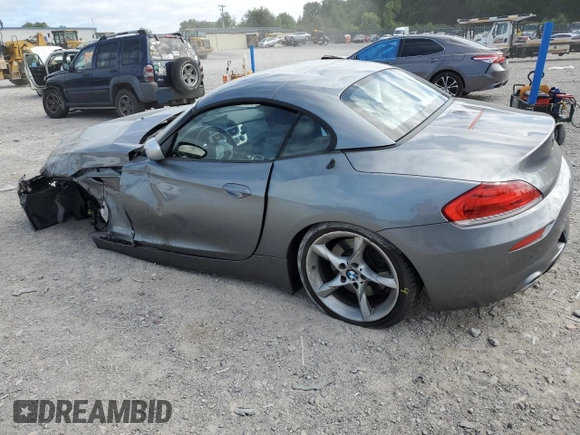 2011 BMW Z4 sDrive35is with VIN WBALM1C50BE633213, listed as a Copart auction lot 61220135 with 62,458 mi miles and Salvage title. Bid and sale history available at DreamBid. Image 2.