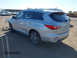 2015 Infiniti QX60 with VIN 5N1AL0MN7FC553099, listed as a IAAI auction lot 42094321 with 100,023 mi miles and . Bid and sale history available at DreamBid. Image 3.
