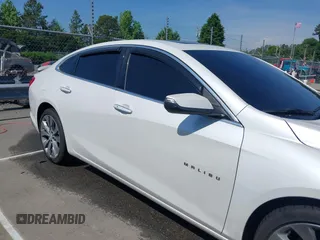 2016 Chevrolet Malibu Premier with VIN 1G1ZH5SX6GF265089, listed as a IAAI auction lot 42148876 with 127,497 mi miles and . Bid and sale history available at DreamBid. Image 14.