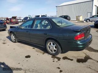 1999 Oldsmobile Intrigue GLS with VIN 1G3WX52H7XF366695, listed as a Copart auction lot 44071415 with 160,527 mi miles and Salvage Title. Bid and sale history available at carsss.com. Image 2.