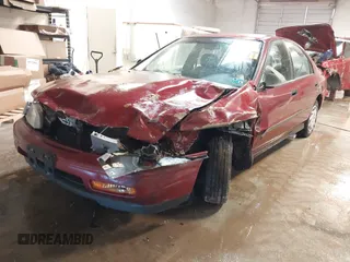 1994 Honda Accord DX with VIN 1HGCD562XRA176098, listed as a IAAI auction lot 41228156 with 113,553 mi miles. Bid and sale history available at carsss.com. Image 2.