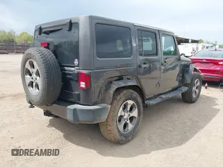 2017 Jeep Wrangler Unlimited Sahara with VIN 1C4BJWEGXHL595724, listed as a IAAI auction lot 42018264 with 95,948 mi miles. Bid and sale history available at carsss.com. Image 4.