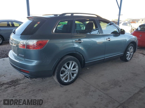 2012 Mazda CX-9 Grand Touring z VIN JM3TB2DA6C0348788, wystawiony jako Copart lot #52444915 z przebiegiem 130 392 mil mil oraz Szkoda całkowita • Salvage title. Historia ofert i sprzedaży dostępna na DreamBid. Obrazek 3.