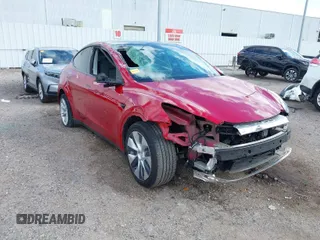 2020 Tesla Model Y Long Range with VIN 5YJYGDEE9LF009957, listed as a IAAI auction lot 41780248 with 31,053 mi miles and . Bid and sale history available at DreamBid. Image 1.