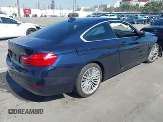 2016 BMW 4 Series 428i with VIN WBA3N7C59GK227052, listed as a IAAI auction lot 41643344 with 69,503 mi miles and . Bid and sale history available at carsss.com. Image 4.