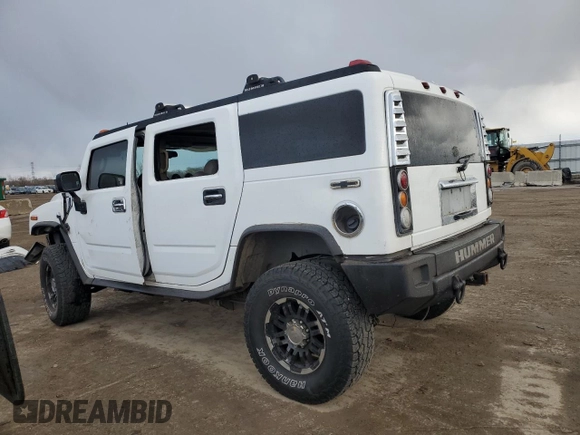 2003 Hummer H2 with VIN 5GRGN23U63H106158, listed as a Copart auction lot 81266274 with 275,953 mi miles and Salvage Title. Bid and sale history available at carsss.com. Image 2.