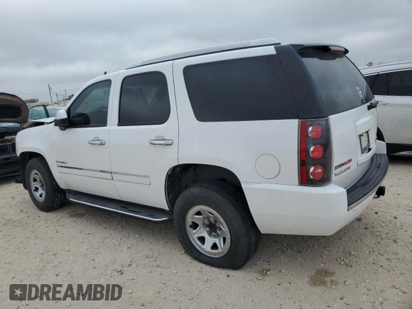 2011 GMC Yukon Denali with VIN 1GKS1EEF7BR400706, listed as a Copart auction lot 85214624 with 326,949 mi miles and Salvage Title. Bid and sale history available at carsss.com. Image 2.
