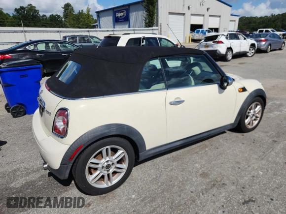 2011 MINI Convertible with VIN WMWZN3C59BTZ78433, listed as a Copart auction lot 65509575 with 102,800 mi miles and Clean title. Bid and sale history available at DreamBid. Image 3.