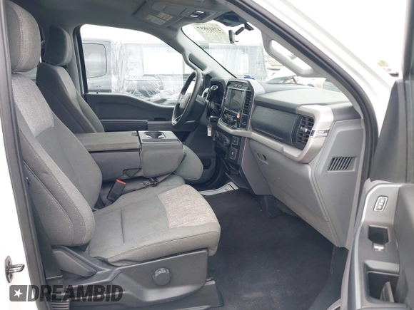 2023 Ford F-150 XL with VIN 1FTEW1C89PKD35641, listed as a IAAI auction lot 42519857 with 55,536 mi miles and . Bid and sale history available at DreamBid. Image 5.