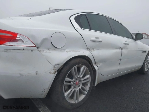 2019 Jaguar XE 25t with VIN SAJAR4FX0KCP52659, listed as a IAAI auction lot 41332080 with 96,936 mi miles. Bid and sale history available at carsss.com. Image 6.