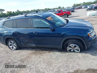 2018 Volkswagen Atlas SE with VIN 1V2CR2CA1JC561003, listed as a IAAI auction lot 42556798 with 124,147 mi miles and . Bid and sale history available at DreamBid. Image 13.