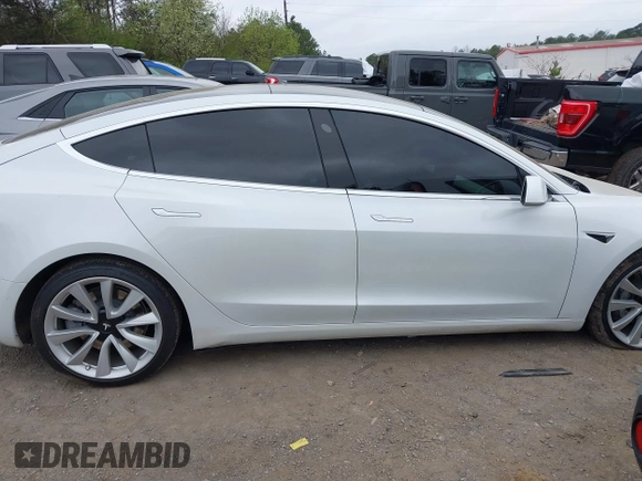 2020 Tesla Model 3 Long Range with VIN 5YJ3E1EB0LF703733, listed as a IAAI auction lot 41796732 with 75,027 mi miles. Bid and sale history available at carsss.com. Image 13.