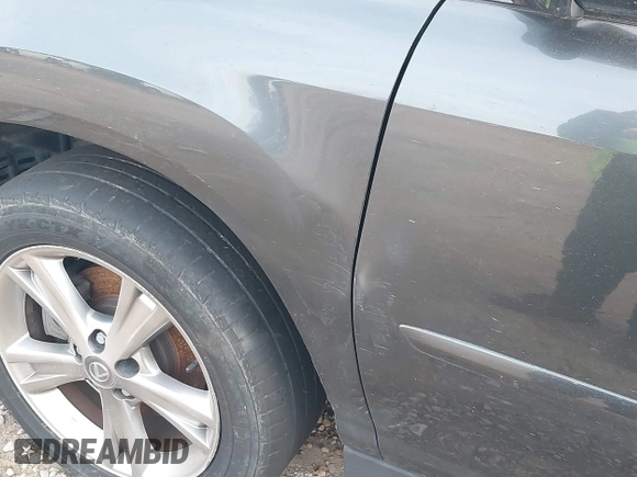 2007 Lexus RX 400h z VIN JTJGW31U372002594, wystawiony jako IAAI lot #41380924 z przebiegiem 243 928 mil mil oraz . Historia ofert i sprzedaży dostępna na DreamBid. Obrazek 12.