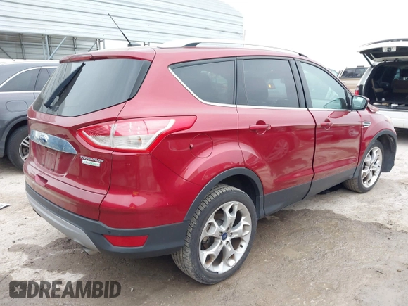 2015 Ford Escape Titanium with VIN 1FMCU0J98FUC07196, listed as a IAAI auction lot 41930660 with 51,161 mi miles and . Bid and sale history available at DreamBid. Image 4.