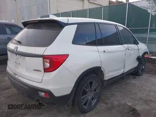 2019 Honda Passport EX-L with VIN 5FNYF8H5XKB008904, listed as a IAAI auction lot 41440706 with 57,317 mi miles and . Bid and sale history available at DreamBid. Image 4.