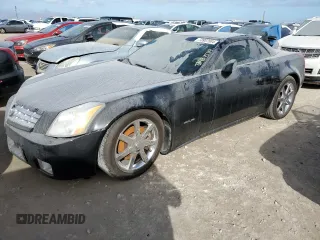 2006 Cadillac XLR z VIN 1G6YV36A965600309, wystawiony jako Copart lot #73937584 z przebiegiem Nie podano mil oraz Szkody całkowita. Historia ofert i sprzedaży dostępna na DreamBid. Obrazek 1.