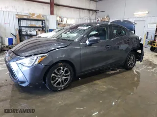2019 Toyota Yaris Sedan L with VIN 3MYDLBYV8KY504326, listed as a Copart auction lot 87878875 with 73,392 mi miles and Salvage Title. Bid and sale history available at carsss.com. Image 1.
