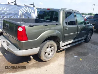 2003 Ford Explorer Sport Trac XLS z VIN 1FMZU67E93UB08190, wystawiony jako IAAI lot #42108621 z przebiegiem 233 972 mil mil oraz . Historia ofert i sprzedaży dostępna na DreamBid. Obrazek 4.