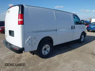 2014 Chevrolet Express Cargo Van with VIN 1GCWGFCAXE1206912, listed as a IAAI auction lot 41700273 with 177,348 mi miles. Bid and sale history available at carsss.com. Image 4.