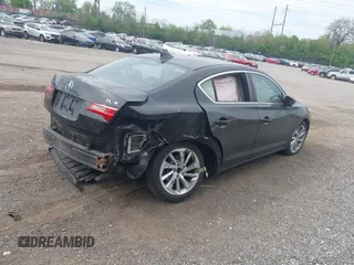 2016 Acura ILX z VIN 19UDE2F30GA005379, wystawiony jako IAAI lot #42079579 z przebiegiem 107 532 mil mil oraz . Historia ofert i sprzedaży dostępna na DreamBid. Obrazek 4.