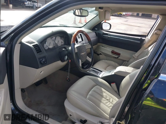 2006 Chrysler 300 C with VIN 2C3LK63H66H142437, listed as a IAAI auction lot 41751890 with 57,374 mi miles. Bid and sale history available at carsss.com. Image 5.