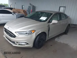 2017 Ford Fusion Titanium with VIN 3FA6P0K96HR346749, listed as a IAAI auction lot 42464431 with 134,933 mi miles and . Bid and sale history available at DreamBid. Image 2.