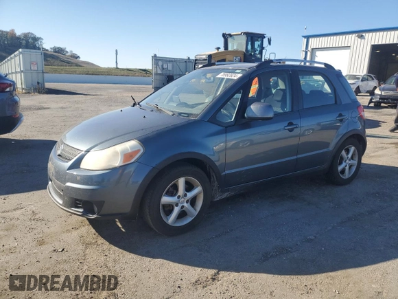 2009 Suzuki SX4 Man Touring Pkg AWD with VIN JS2YB417X96203042, listed as a Copart auction lot 76992624 with 183,776 mi miles and Non Repairable. Bid and sale history available at carsss.com. Image 1.
