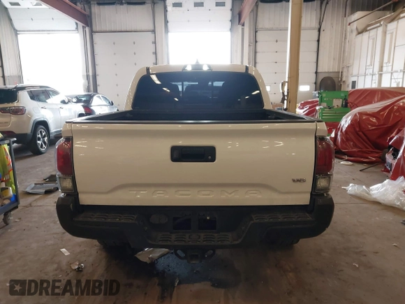 2021 Toyota Tacoma SR z VIN 5TFCZ5AN1MX268370, wystawiony jako IAAI lot #41922632 z przebiegiem 50 358 mil mil oraz . Historia ofert i sprzedaży dostępna na DreamBid. Obrazek 16.