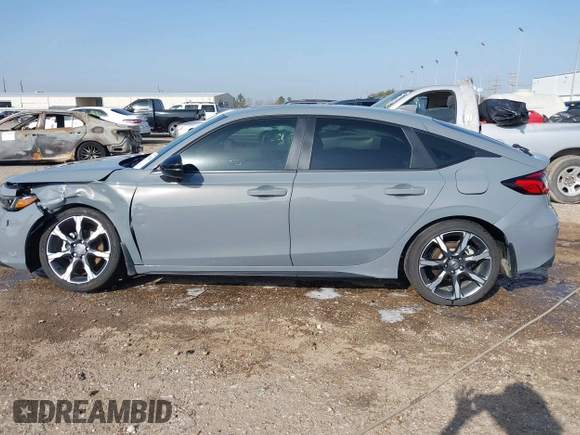 2025 Honda Civic Sport Touring z VIN 19XFL4H94SE000539, wystawiony jako IAAI lot #41777545 z przebiegiem 7 128 mil mil oraz . Historia ofert i sprzedaży dostępna na DreamBid. Obrazek 14.