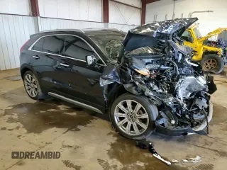 2023 Cadillac XT4 AWD Premium Luxury z VIN 1GYFZDR47PF209282, wystawiony jako Copart lot #51175635 z przebiegiem Nie podano mil oraz Szkoda całkowita • Salvage title. Historia ofert i sprzedaży dostępna na DreamBid. Obrazek 14.