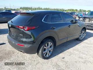 2023 Mazda CX-30 S Select with VIN 3MVDMBBM9PM508958, listed as a IAAI auction lot 42009029 with 21,219 mi miles and . Bid and sale history available at DreamBid. Image 4.