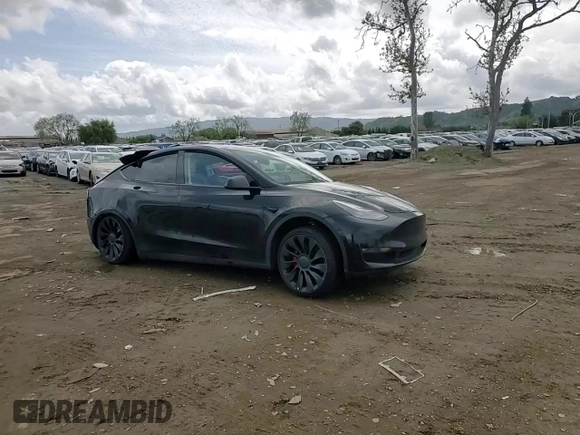 2022 Tesla Model Y Performance with VIN 7SAYGDEF1NF404133, listed as a Copart auction lot 51108165 with 44,102 mi miles and Salvage Title. Bid and sale history available at DreamBid. Image 11.