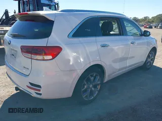 2016 Kia Sorento SX z VIN 5XYPKDA5XGG173541, wystawiony jako IAAI lot #40916121 z przebiegiem Nie podano mil oraz . Historia ofert i sprzedaży dostępna na DreamBid. Obrazek 4.