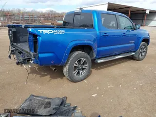 2018 Toyota Tacoma SR with VIN 3TMCZ5AN3JM136826, listed as a IAAI auction lot 41664482 with 124,731 mi miles. Bid and sale history available at carsss.com. Image 4.