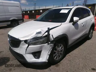 2014 Mazda CX-5 Touring with VIN JM3KE2CY7E0364311, listed as a IAAI auction lot 42108176 with 90,506 mi miles and . Bid and sale history available at DreamBid. Image 6.