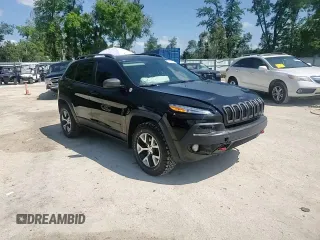 2017 Jeep Cherokee Trailhawk L Plus with VIN 1C4PJMBBXHW517252, listed as a Copart auction lot 51414315 with 185,274 mi miles and Salvage Title. Bid and sale history available at carsss.com. Image 11.