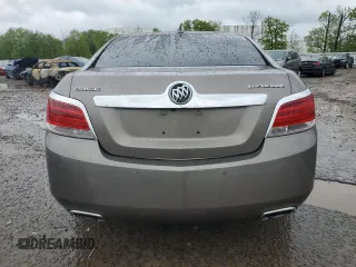 2012 Buick LaCrosse Premium 2 z VIN 1G4GF5E3XCF353906, wystawiony jako Copart lot #57954945 z przebiegiem 110 484 mil mil oraz Szkoda całkowita • Salvage title. Historia ofert i sprzedaży dostępna na DreamBid. Obrazek 6.