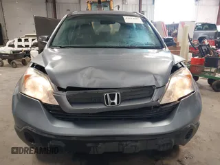 2009 Honda CR-V LX with VIN JHLRE48359C018488, listed as a IAAI auction lot 41824887 with 203,235 mi miles. Bid and sale history available at carsss.com. Image 12.