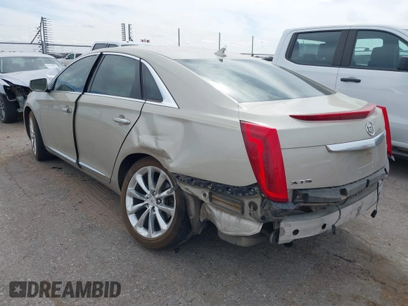 2013 Cadillac XTS Luxury with VIN 2G61P5S30D9132193, listed as a IAAI auction lot 41897709 with 140,780 mi miles and . Bid and sale history available at DreamBid. Image 3.