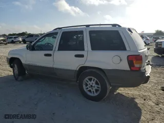 2002 Jeep Grand Cherokee Laredo with VIN 1J4GW48S12C312348, listed as a Copart auction lot 51786715 with 229,698 mi miles and Clean Title. Bid and sale history available at carsss.com. Image 2.