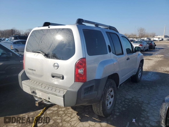2014 Nissan Xterra X with VIN 5N1AN0NW1EN804235, listed as a Copart auction lot 83661084 with 103,482 mi miles and Salvage Title. Bid and sale history available at DreamBid. Image 3.
