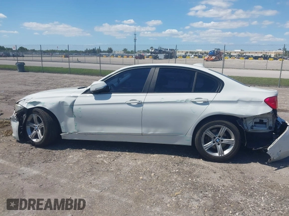 2014 BMW 3 Series 320i with VIN WBA3B1C51EK131063, listed as a IAAI auction lot 42043086 with 92,306 mi miles. Bid and sale history available at carsss.com. Image 14.
