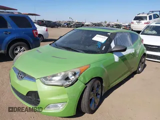2012 Hyundai Veloster w/Gray Int z VIN KMHTC6AD5CU040673, wystawiony jako IAAI lot #41491429 z przebiegiem Nie podano mil oraz . Historia ofert i sprzedaży dostępna na DreamBid. Obrazek 17.