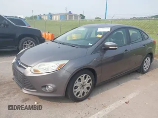 2012 Ford Focus SE z VIN 1FAHP3F24CL227225, wystawiony jako IAAI lot #42389939 z przebiegiem 135 197 mil mil oraz . Historia ofert i sprzedaży dostępna na DreamBid. Obrazek 17.