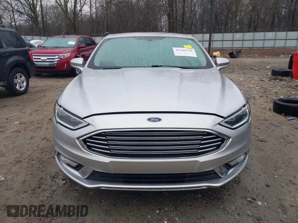 2017 Ford Fusion Titanium with VIN 3FA6P0SU9HR191490, listed as a IAAI auction lot 41560360 with 148,017 mi miles and . Bid and sale history available at DreamBid. Image 12.