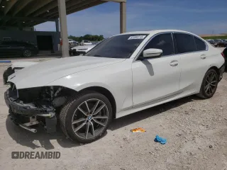 2019 BMW 3 Series 330i xDrive with VIN WBA5R7C59KAJ87597, listed as a Copart auction lot 63399715 with 73,900 mi miles and Salvage title. Bid and sale history available at DreamBid. Image 1.