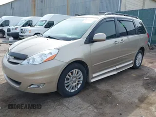 2008 Toyota Sienna XLE with VIN 5TDZK22C68S188410, listed as a IAAI auction lot 41941789 with 164,164 mi miles and . Bid and sale history available at DreamBid. Image 2.